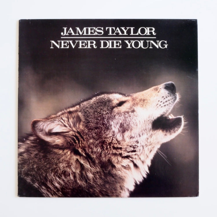 JAMES TAYLOR - NEVER DIE YOUNG [used]